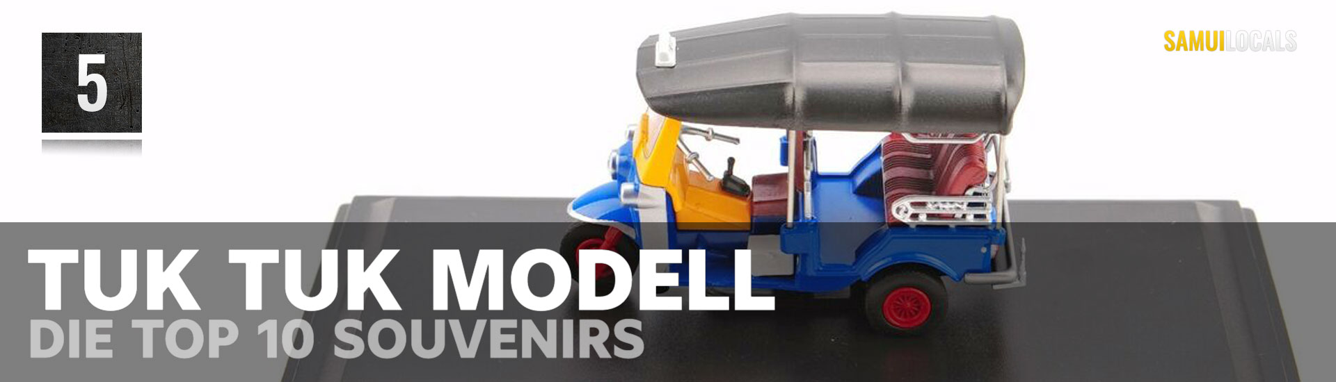 Miniaturmodell eines Tuk-Tuk als Souvenir aus Thailand